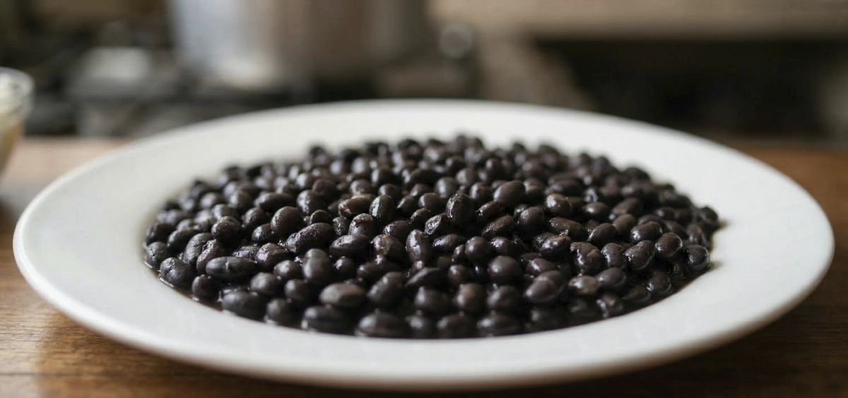 Venezuelan black beans technique, cooking control, and why they define the balance of the plate